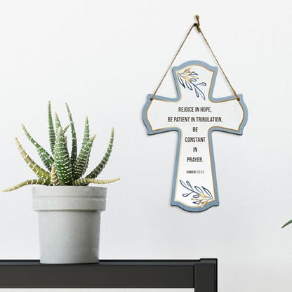 Rejoice in hope, be patient in tribulation, be constant in prayer. Romans 12:12 11.5" x 8" Cross Hanging Sign | Rustic Twine | Inspiring Religious Bible Decor
