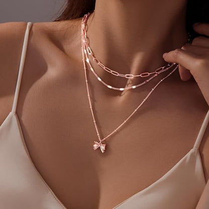 Poxtex Layered Gold Necklaces for Women, Stackable Dainty 14K Gold Silver Plated Trendy Simple Heart Diamond Cross Bow Circle Pendant Paperclip Choker Dot Chain Necklace,Jewelry Set Gifts for Women - color: Rose Gold, style: Bow1