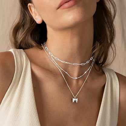 Poxtex Layered Gold Necklaces for Women, Stackable Dainty 14K Gold Silver Plated Trendy Simple Heart Diamond Cross Bow Circle Pendant Paperclip Choker Dot Chain Necklace,Jewelry Set Gifts for Women - color: Silver, style: Bow1